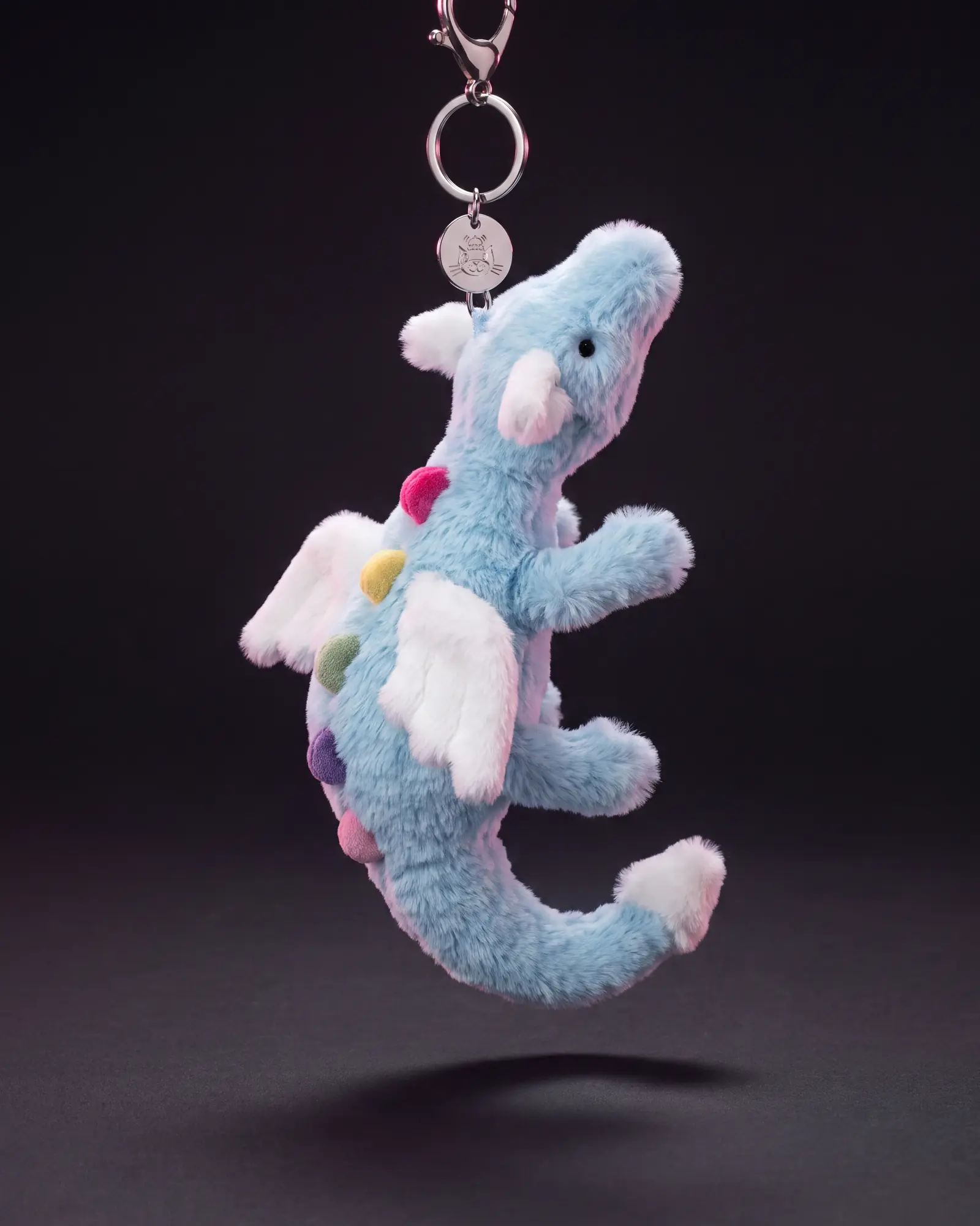 Sky Dragon Bag Charm on a dark studio background.